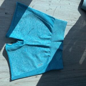 Gymshark light blue cropped shorts.